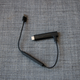 The extra power dongle is not large, but it is larger than a regular USB cable.